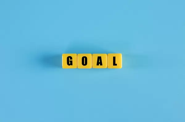 Goal text on yellow cubes