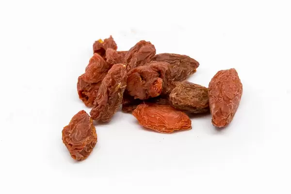 Goji berries on white background