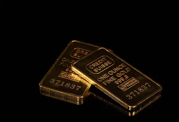 Gold bars on black background