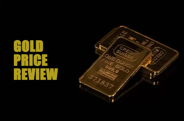 Gold bars with Gold Price Review text on black background