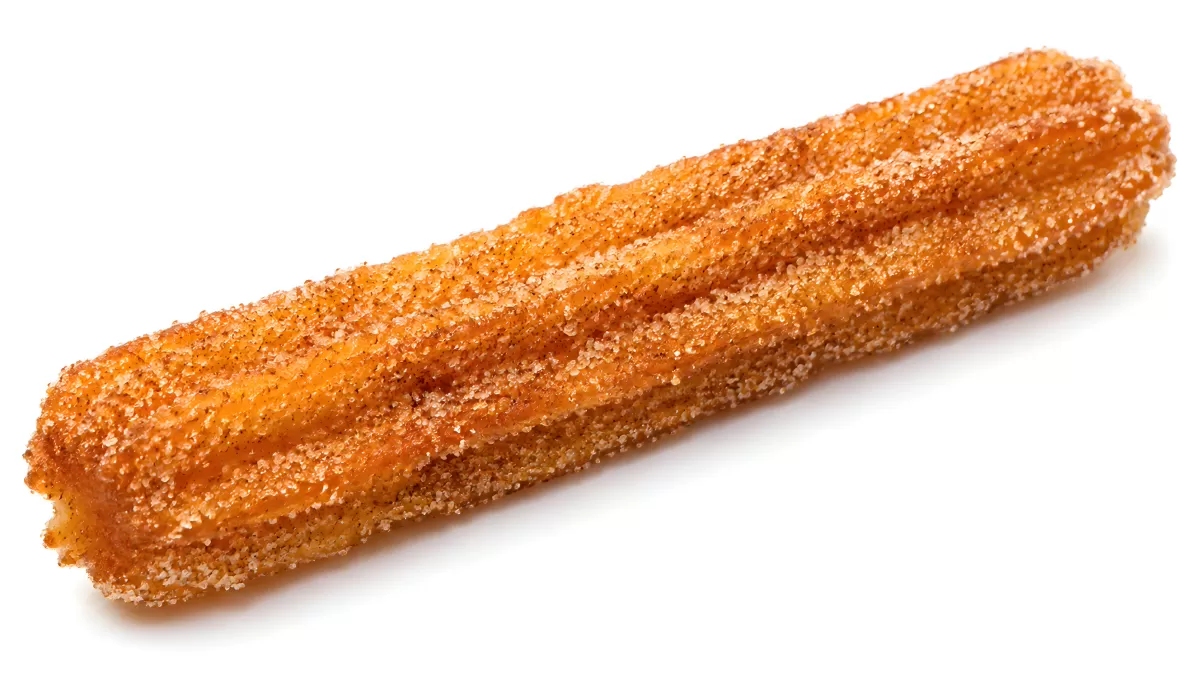 Goldbrauner Churro mit Zimt und Zucker bestreut — Bild kostenlos herunterladen