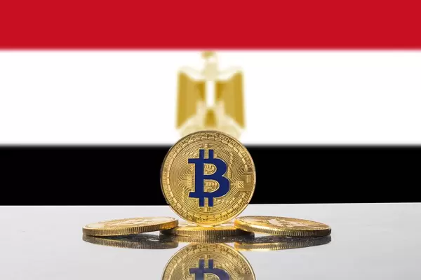 Golden Bitcoin and flag of Egypt