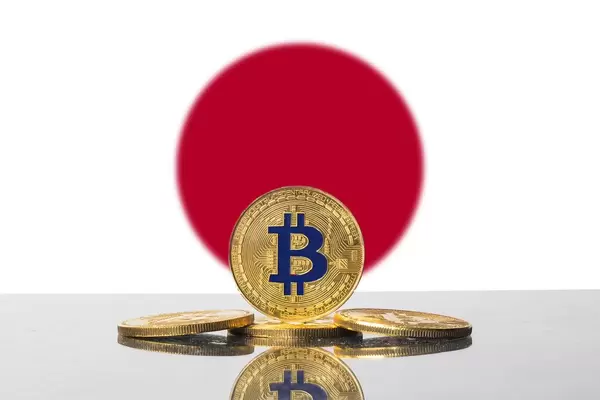 Golden Bitcoin and flag of Japan