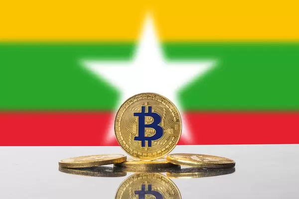 Golden Bitcoin and flag of Myanmar
