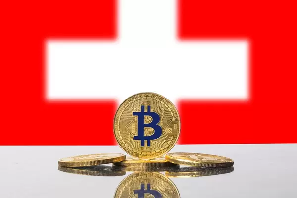Golden Bitcoin and flag of Switzerland