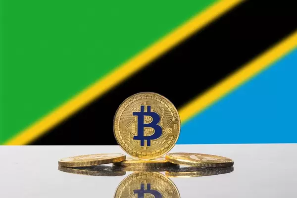 Golden Bitcoin and flag of Tanzania