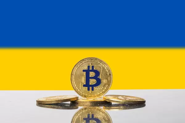 Golden Bitcoin and flag of Ukraine