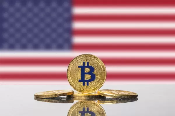 Golden Bitcoin and flag of United States