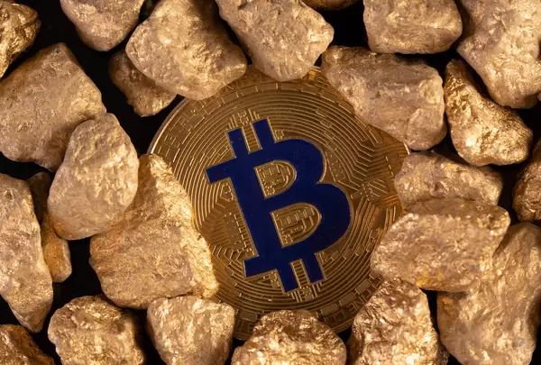 Golden Bitcoin Coin and mound of gold