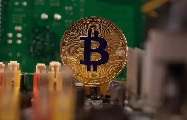 Golden Bitcoin on computer parts