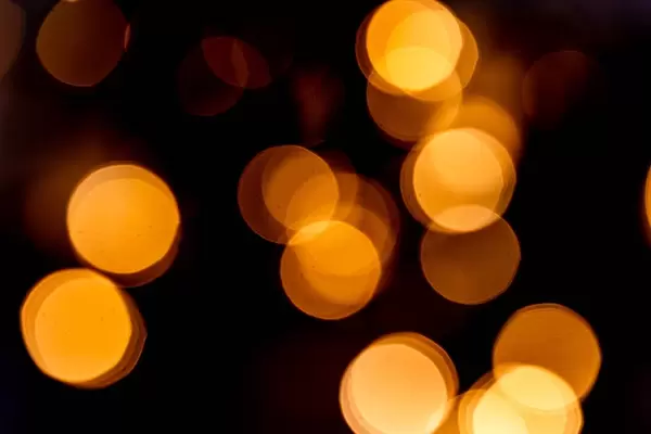 Golden bokeh on black background (Flip 2019)