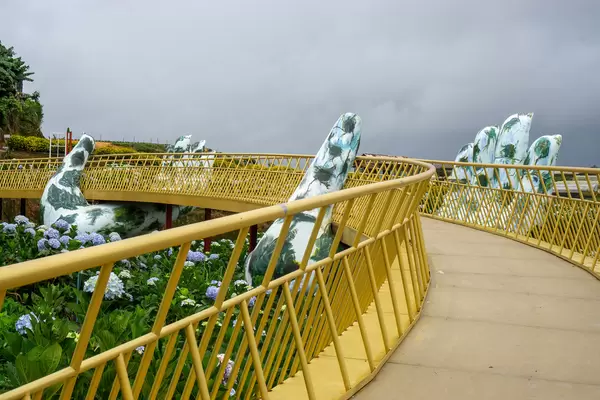 Golden Bridge with Giant Hands as Copy at Hydrangea Flower Garden in Da Lat, Vietnam