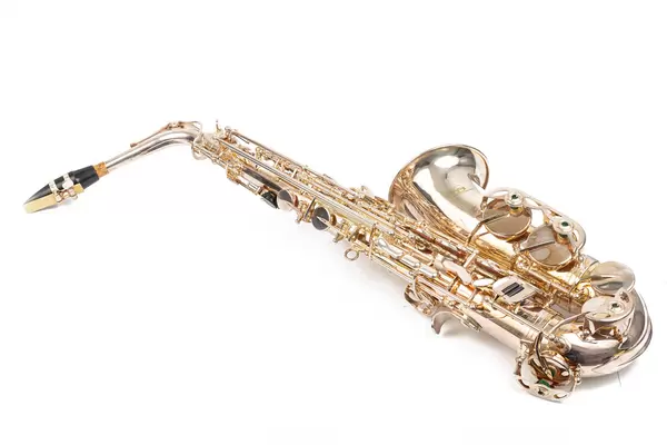 Golden Metal Saxophone isolated above white background