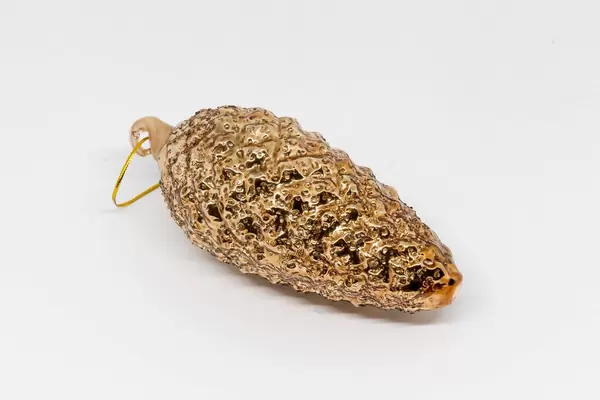 Golden pine cone for Christmas tree