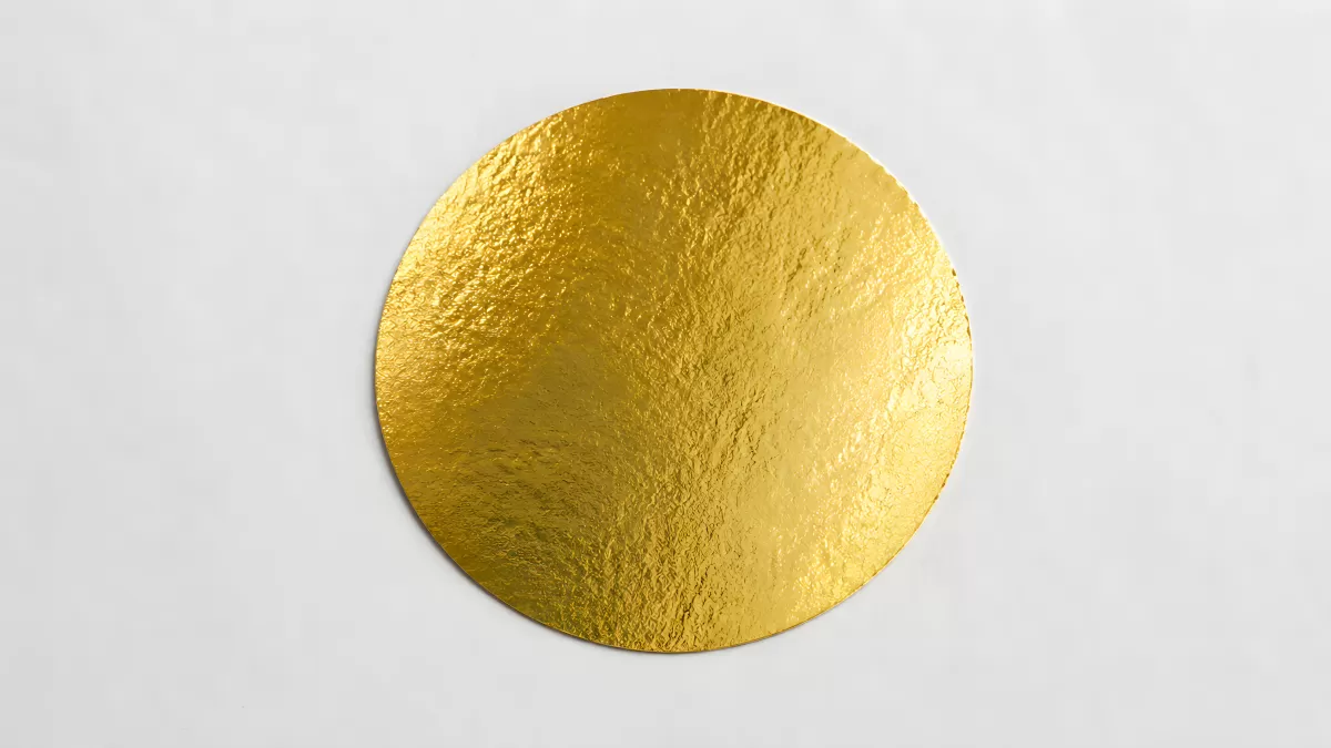 Goldene Kreisscheibe mit glänzender Metalloberfläche