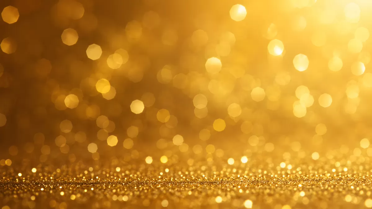 Goldener Bokeh-Hintergrund mit Glitzer und Lichtreflexen