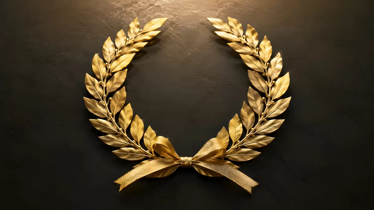 Goldener Lorbeerkranz mit Schleife auf dunklem Hintergrund
