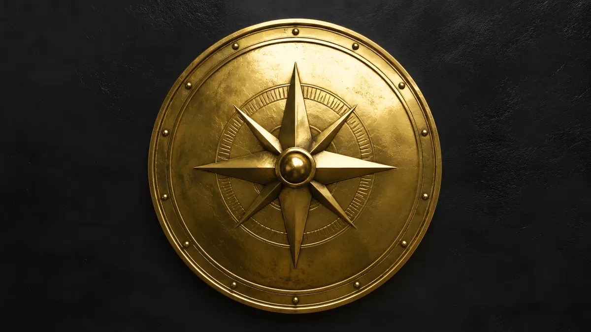 Goldenes Rundschild mit Kompassrose aus Messing