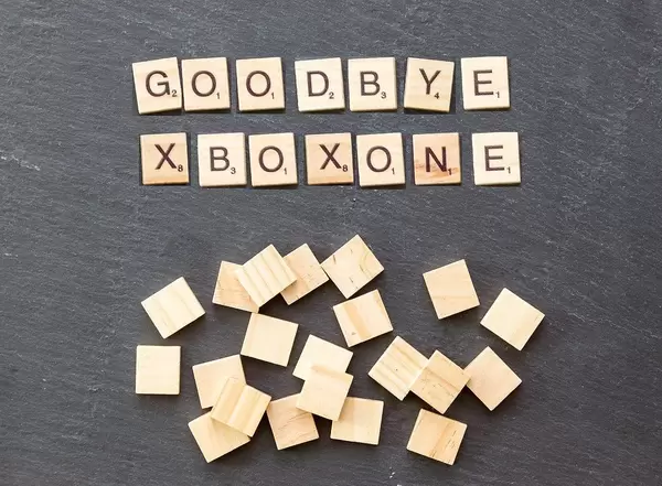 Goodbye Xbox One wooden tiles on a stone surface