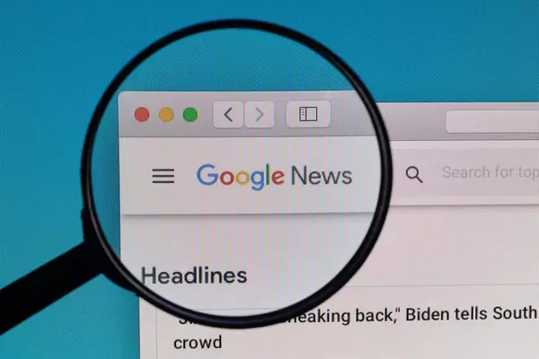 Google News logo under magnifying glass