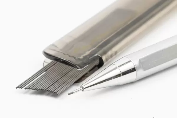 Graphite for school pencils above white background