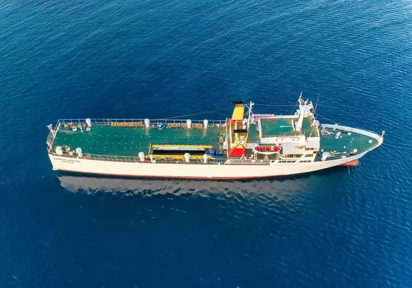 Greek freighter Kapetan Christos in the southern Aegean Sea. Aerial view