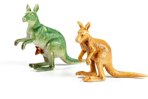 Green and brown kangaroo plastic figurines