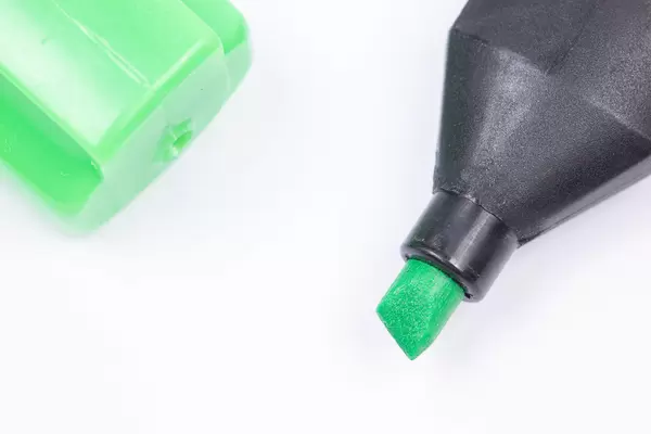 Green Felt Pen above white background