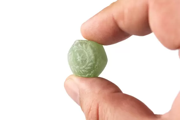 Green Menthol Candy in the hand (Flip 2019)