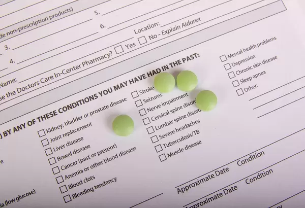 Green pills on Medical History Form