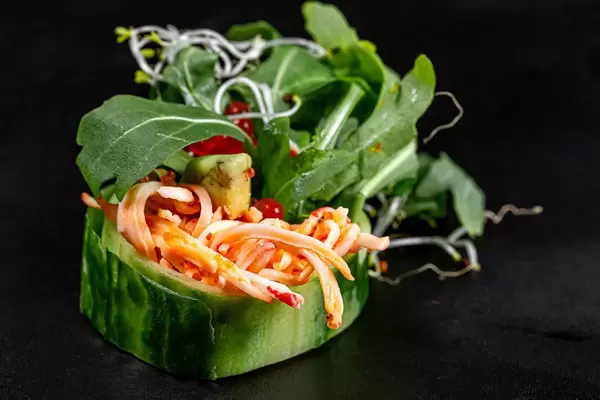 Green roll with crab meat, red caviar, arugula and micro greenery