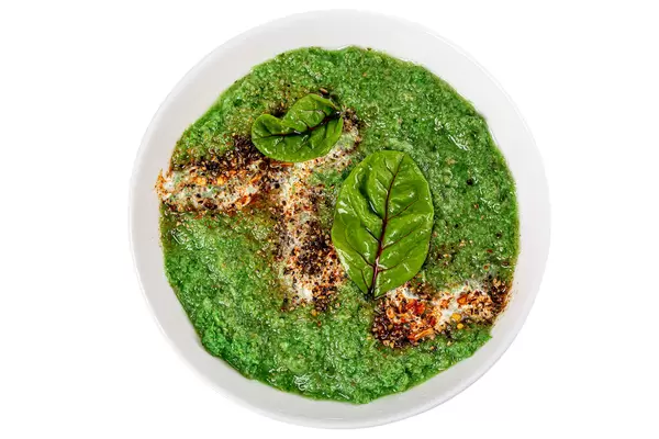 Green vegetable cream soup, top view