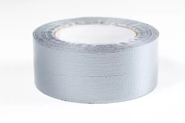 Grey adhesive tape on white background