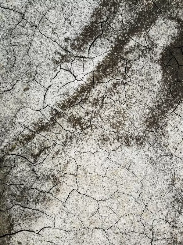 Grey Patterned Floor Background With Cracks