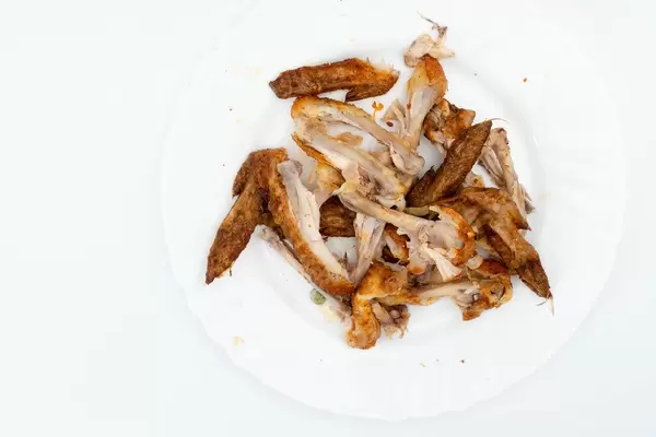 Grilled Chicken wings leftovers on the plate