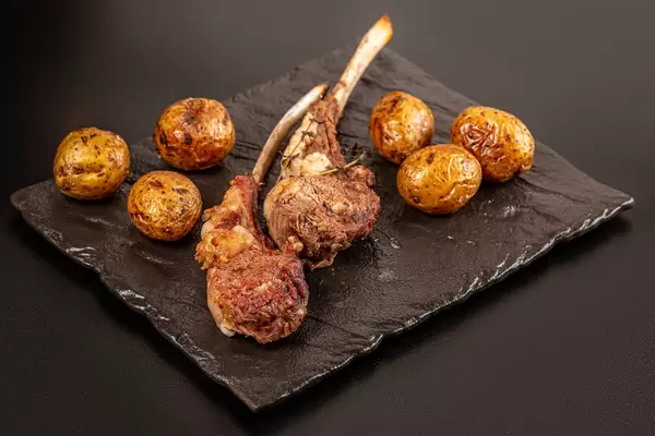 Grilled lamb ribs with potatoes
