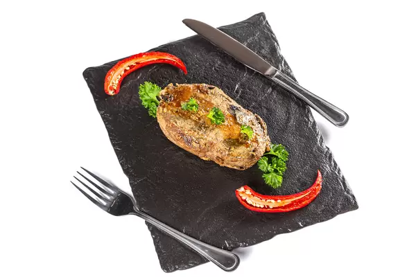 Grilled pork meat with fresh parsley and hot pepper