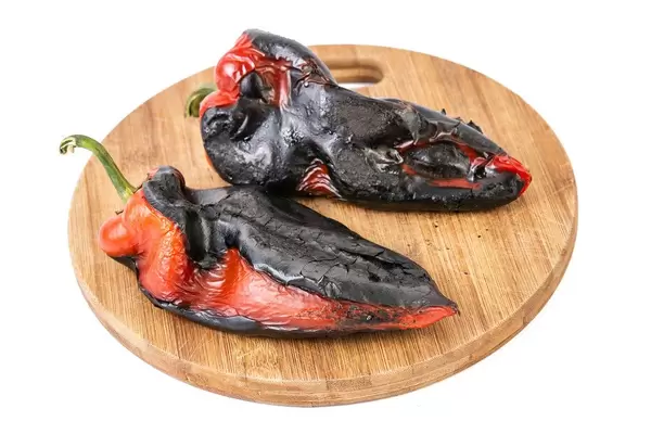 Grilled Red Paprika on the wooden board (Flip 2019)