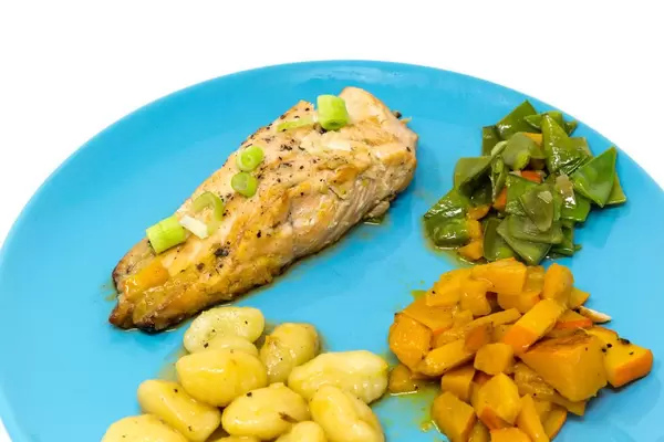 Grilled Salmon-steak in Hoisin-Miso sauce with pumpkin-sugarsnap stew and gnocchi