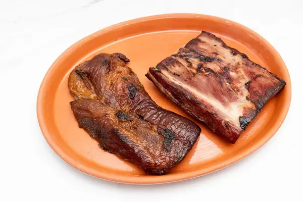Grilled Smoked Pork Neck served on the plate