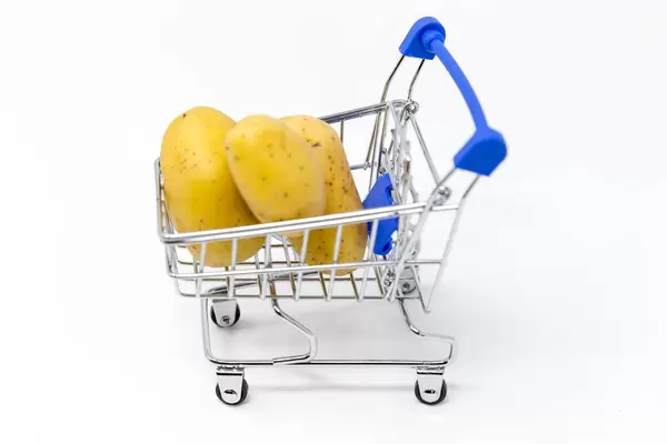 Grocery shopping - potatoes in a shopping cart