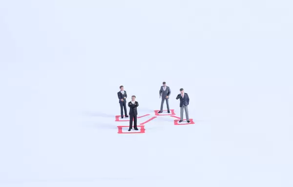 Group of businessman standing in red squares