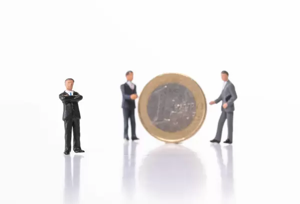 Group of businessman with 1 Euro coin on white background