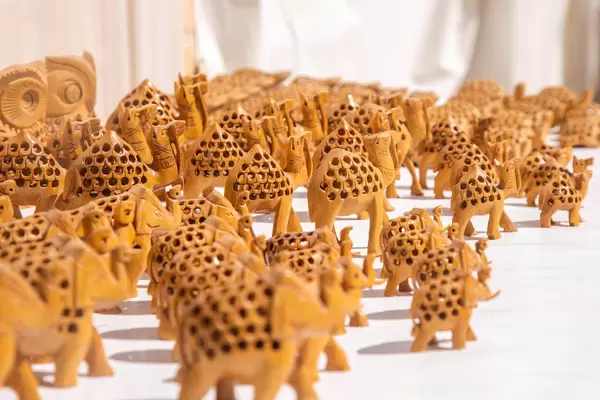 Group of handmade little wooden elephant souvenirs (Flip 2019)