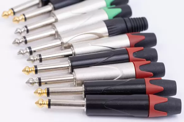 Group of Mono Jack connectors 1/4 above white background