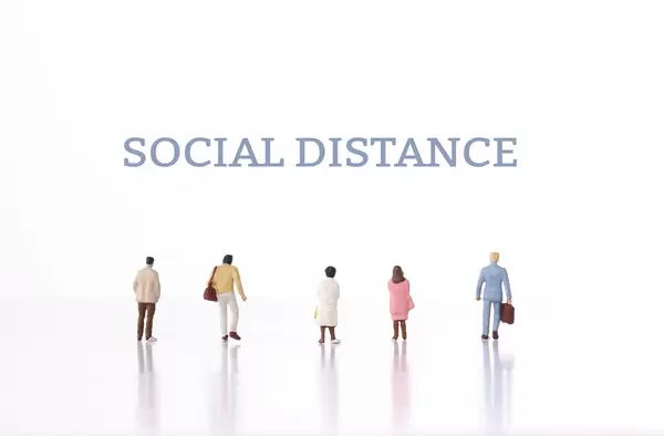 Group of people and Social Distance text
