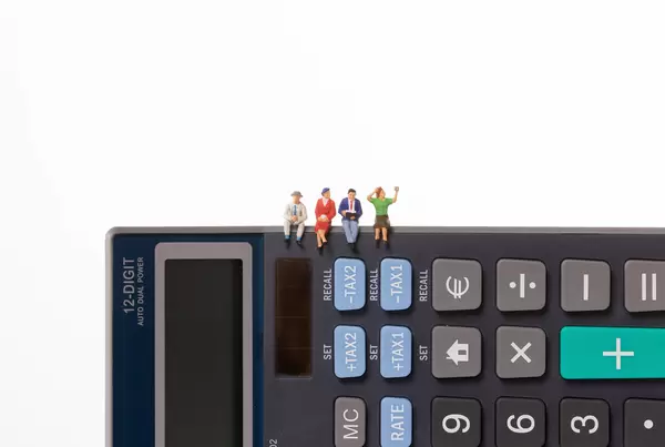 Group of people sitting on calculator with white background