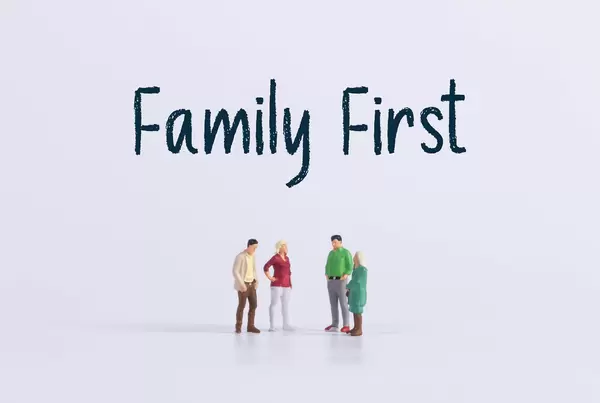 Group of people with Family First text