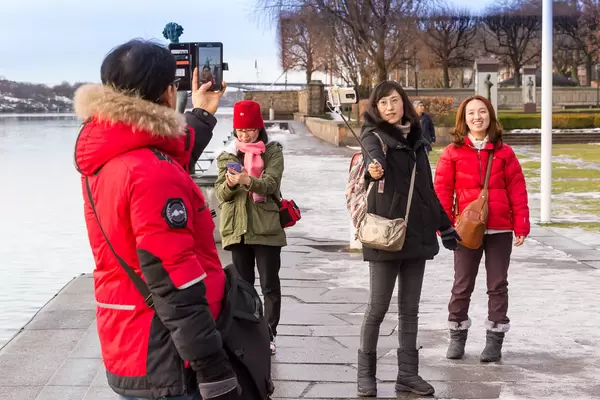 Group with Selfie Sticks