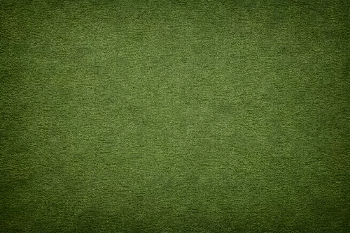 Grüne strukturierte Wand mit matter Textur